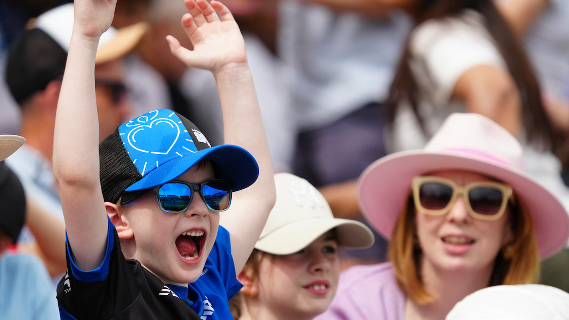 kidcheeringhundred24.jpg